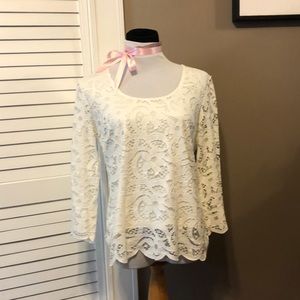 Nanette Lepore. Medium cream lace and lycra top. Zipper in back.